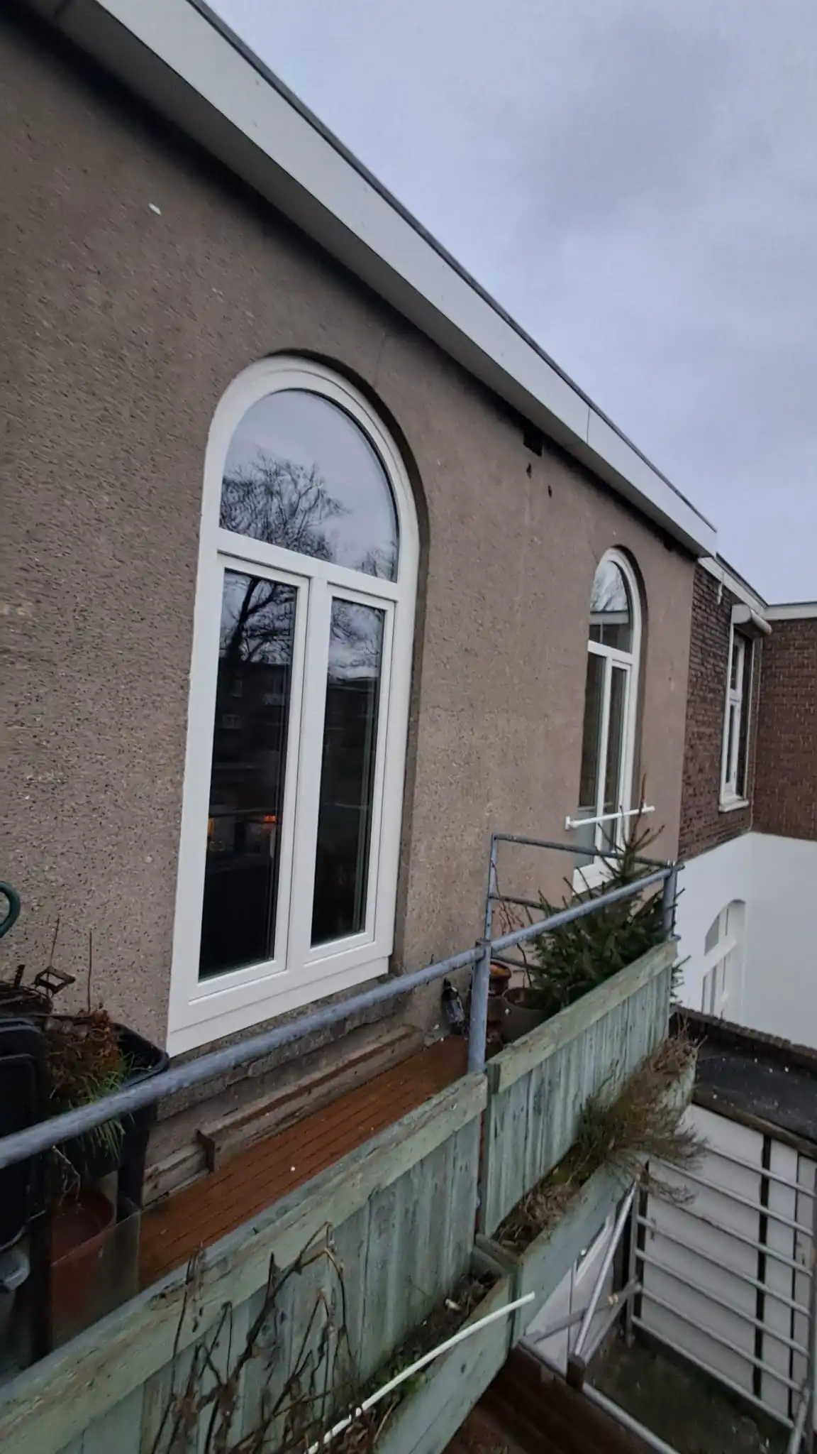 Klassiek gebogen kunststof kozijn bij een woning in Nijmegen